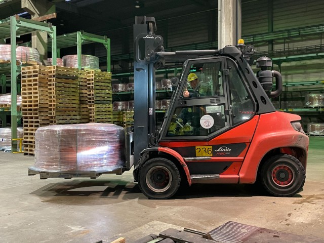 Theo in a forklift